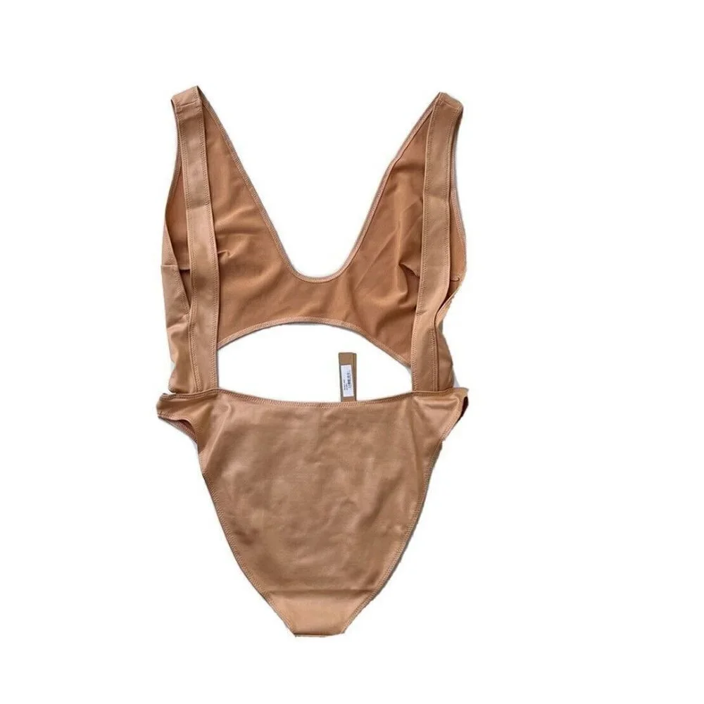 SKIMS Kim Kardashian Wet Jersey Cutout Swimsuit in Orche